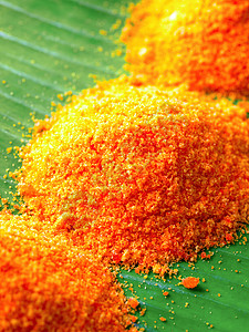 棕榈糖颗粒剂椰子橙子颗粒食物水晶背景图片