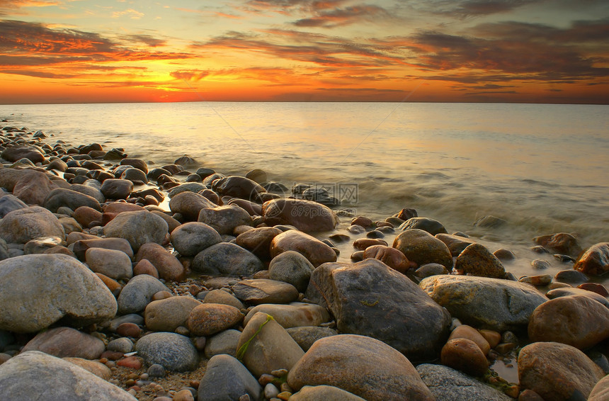 波罗的海海滩太阳日落海洋橙子支撑天空海岸动作日出图片