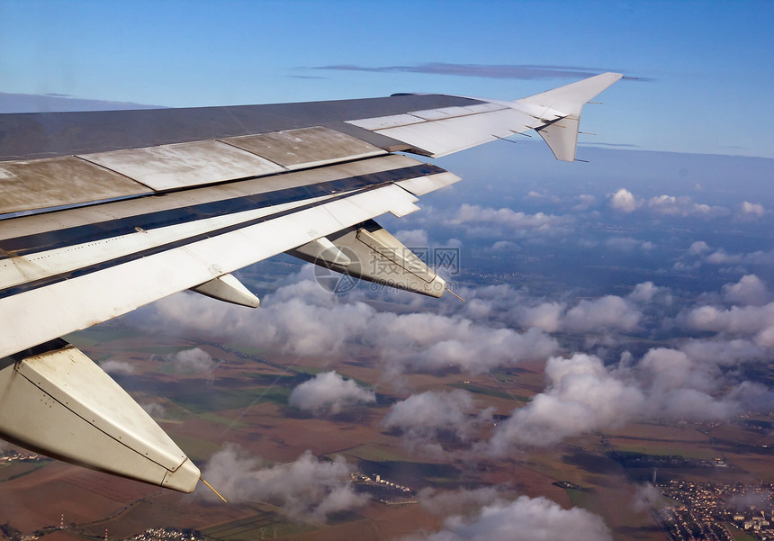 空气中飞行旅游翅膀旅行航班天空航空假期高度土地图片