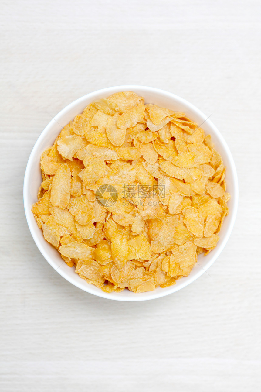 玉米片玉米谷物宏观工作室棕色饮食薄片白色盘子营养图片