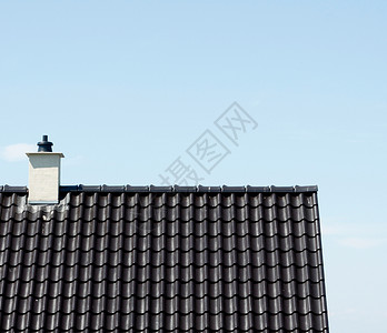 众议院瓷砖房地产烟囱天空屋顶建筑学投资蓝色黑色建筑背景图片