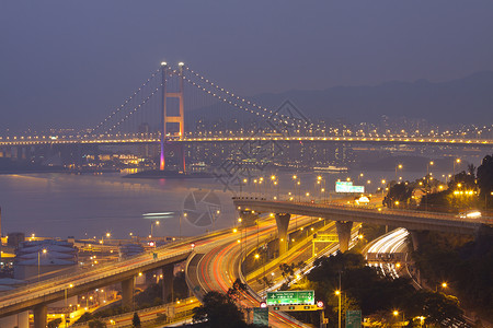 清澜大桥清马桥和日落时的高速公路展示了现代风景背景