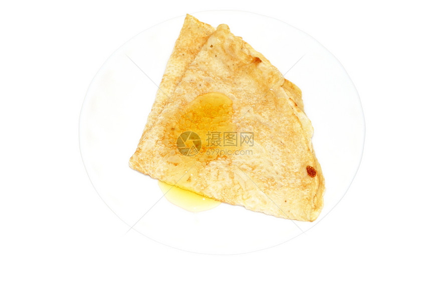 带蜂蜜的煎饼盘子狂潮传统风俗食物飞碟甜点餐具文化白色图片
