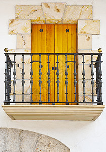 折叠阳台的门横交窗户叶子玻璃建筑繁荣阳台历史性栏杆财富格栅背景