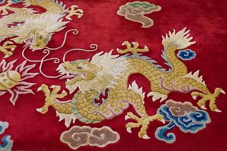 地毯上的龙图像衬垫花丝印刷品文化传统挂毯火焰古董印象墙纸背景图片