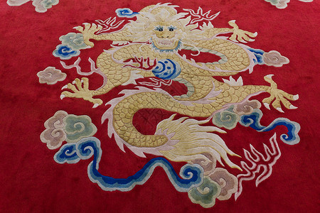 地毯上的龙图像背布印刷品古董传统挂毯文化火焰衬垫打印花丝背景图片