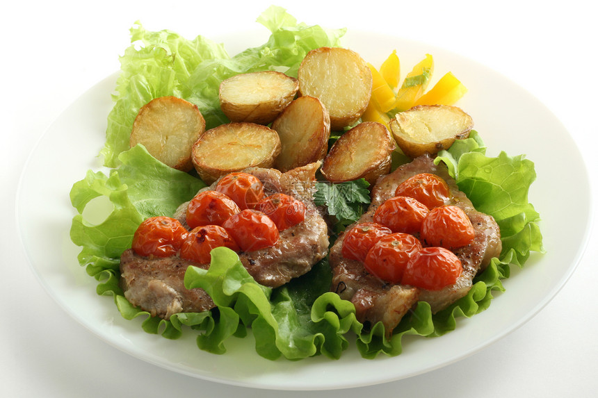 番茄和土豆炒猪肉午餐土豆蔬菜香菜白色红色食物香料猪肉油炸图片