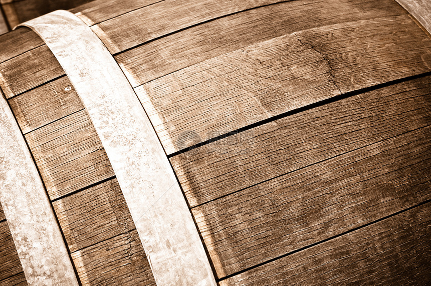 橡树酒桶硬木棕色宏观木头镶板圆圈古董框架金属贮存图片