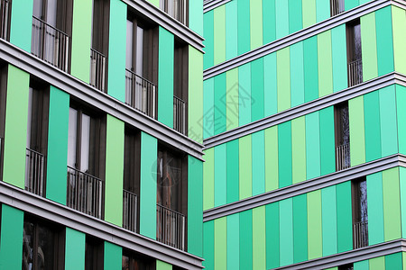办公大楼城市玻璃外观办公楼场景房子镶板绿色建筑背景图片