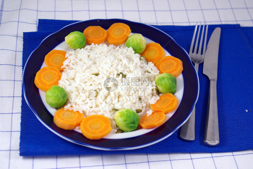 大米饭盘子倾斜食物营养蔬菜桌子蓝色素菜萝卜桌布图片
