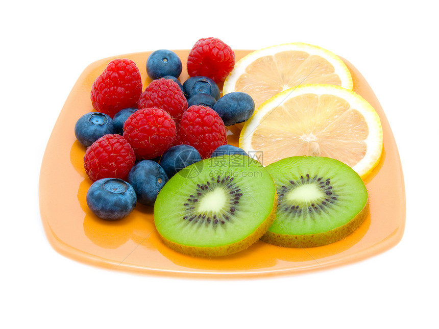 盘子上的水果 孤立背景图片