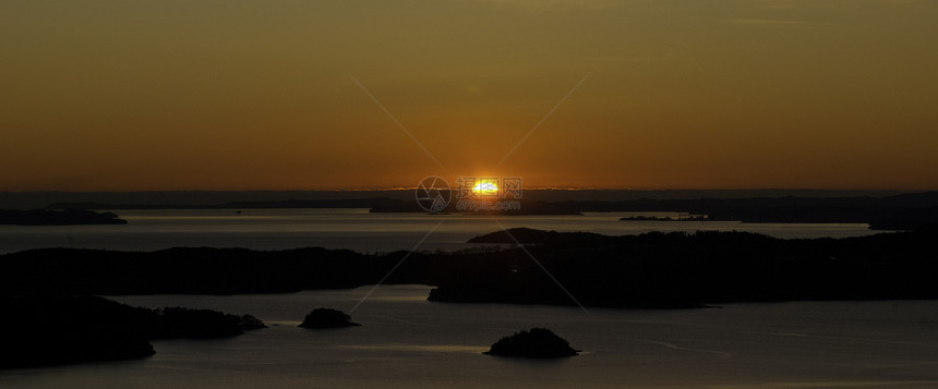 日落海洋海景太阳黄色天空图片