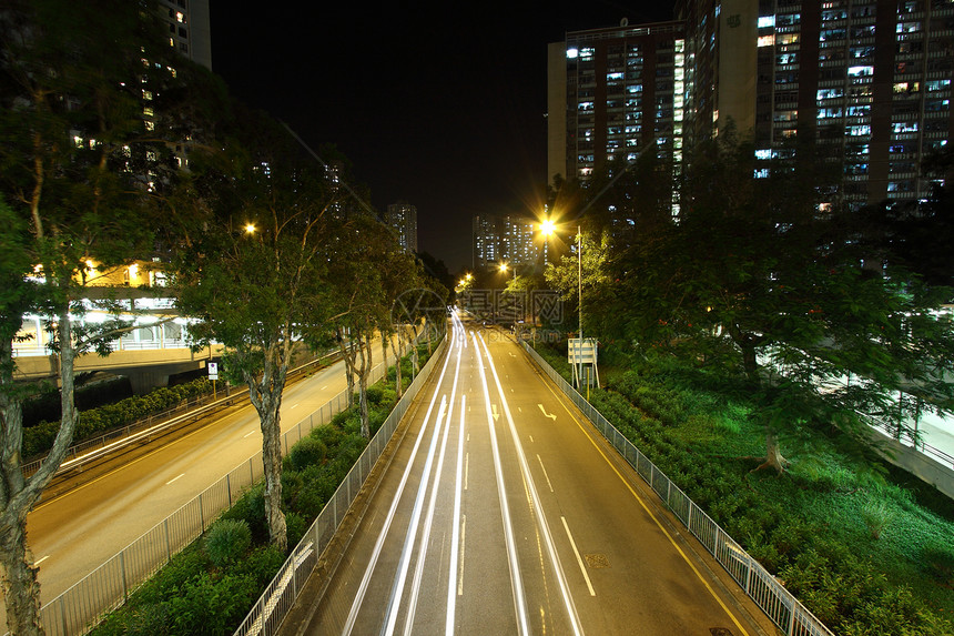 香港晚上公路交通量夜间戏剧性公共汽车场景商业速度辉光市中心城市驾驶街道图片