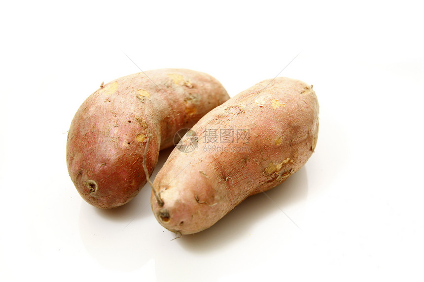 在白色背景上孤立的甜土豆养分糖类宏观维生素杂货店番薯块茎矿物质营养蔬菜图片