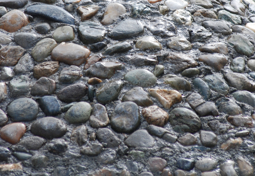 碎石岩小路鹅卵石历史性石头灰色街道地面胡同路面图片