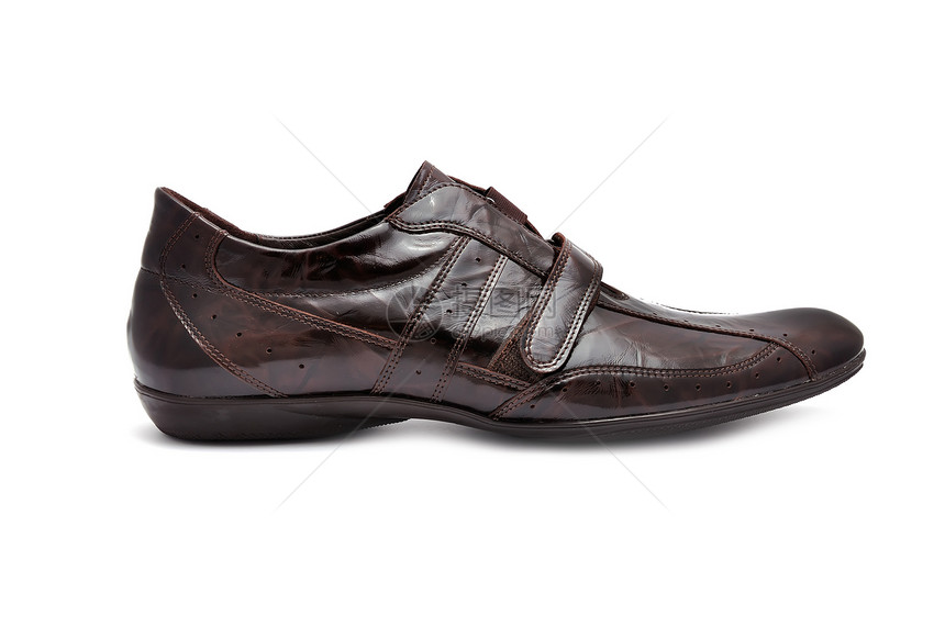 棕色皮鞋鞋类跑步水平宏观橡皮衣服运动运动装皮革铆钉图片