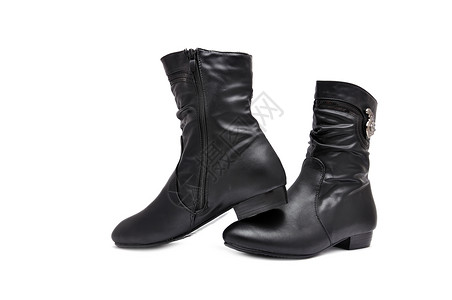黑人妇女靴子衣服拉链皮革高跟鞋黑色背景图片