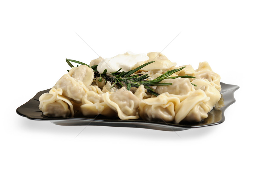 拉维奥利在盘子上饺子食物白色水饺小吃午餐美食面粉螳螂面团图片