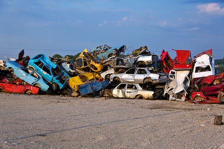 垃圾场的垃圾车垃圾环境回收金属废金属背景图片