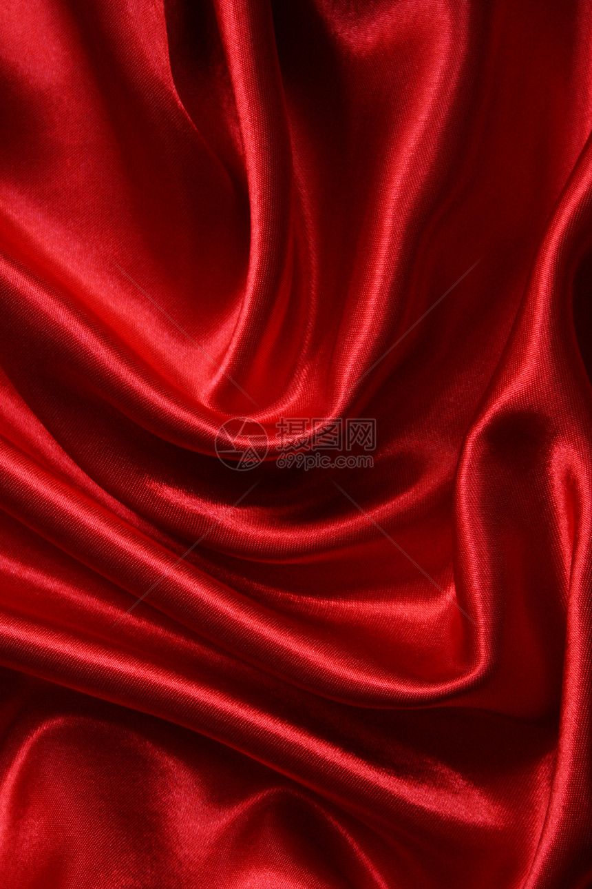 平滑优雅的红色丝绸可用作背景投标曲线纺织品奢华胭脂布料窗帘海浪柔软度材料图片