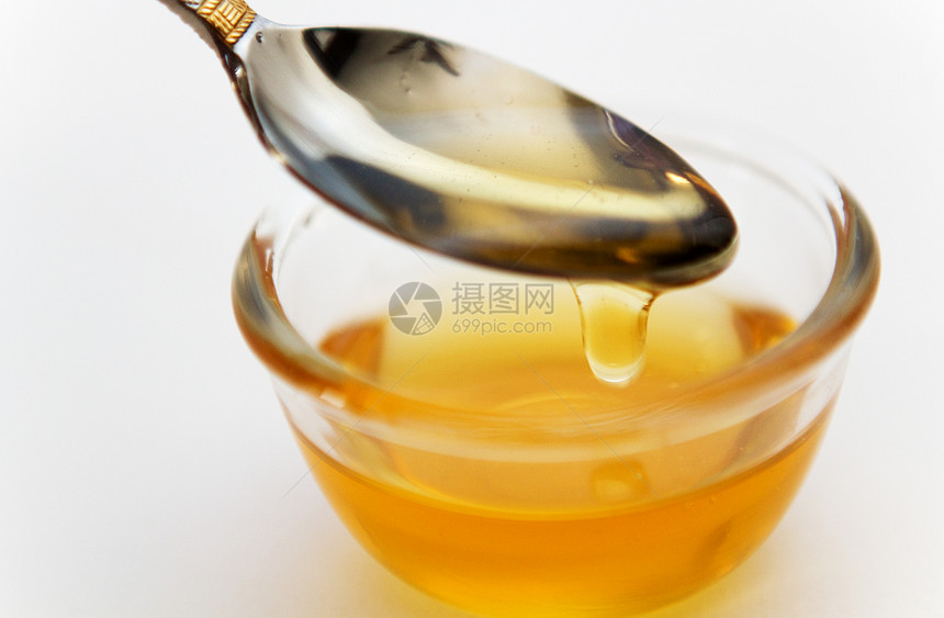 金金蜂蜜荒野甜点生活晴天勺子玻璃营养滴水白色流动图片