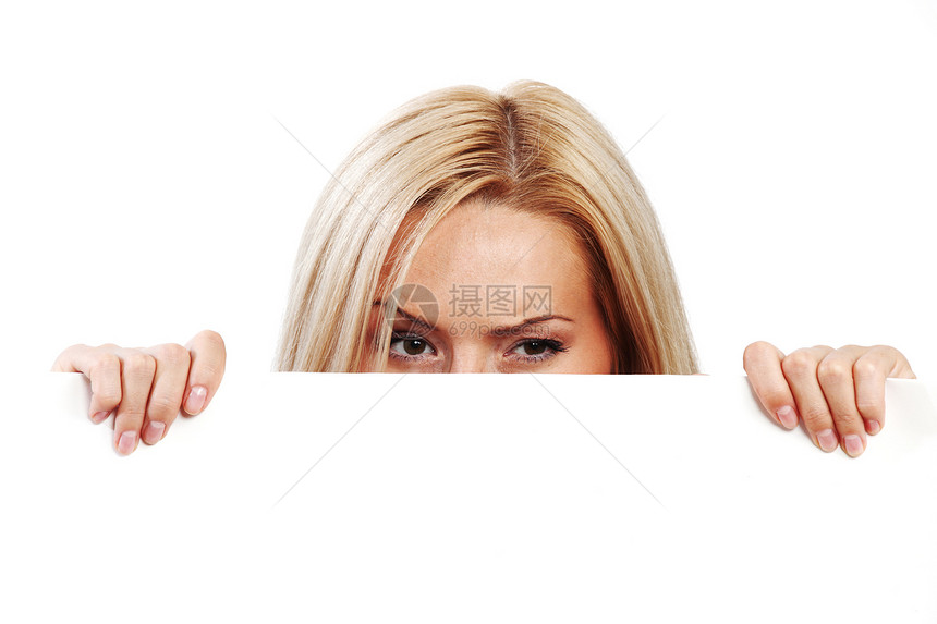 隐藏在纸面后面的妇女乐趣女孩横幅广告牌女性金发人士海报木板商业图片