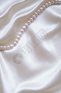 以珍珠为婚礼背景的平滑 优雅的白丝绸曲线材料衣服纺织品织物布料生产版税奢华寝具背景图片