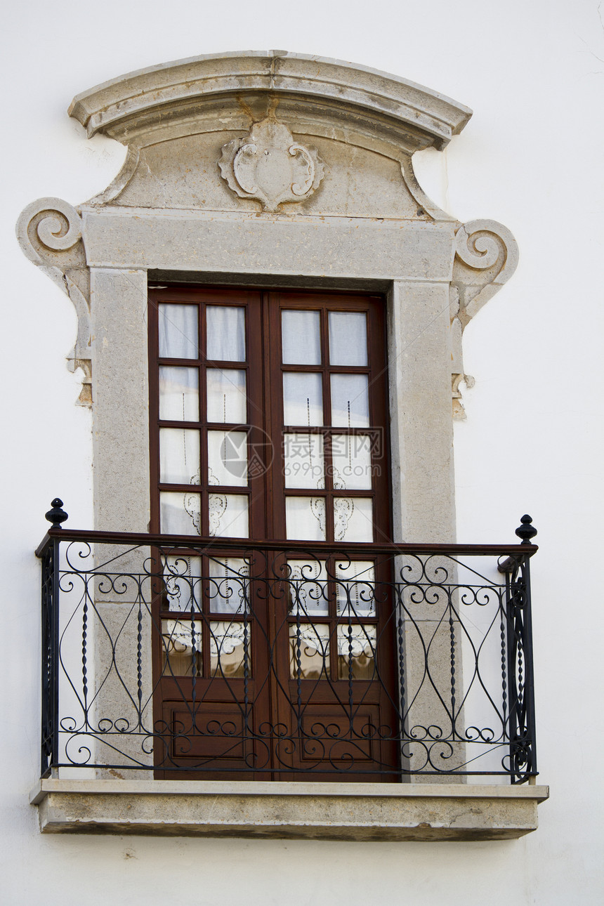 葡萄牙语窗口房子奢华黄色建筑住宅建筑学大理石窗户阳台白色图片