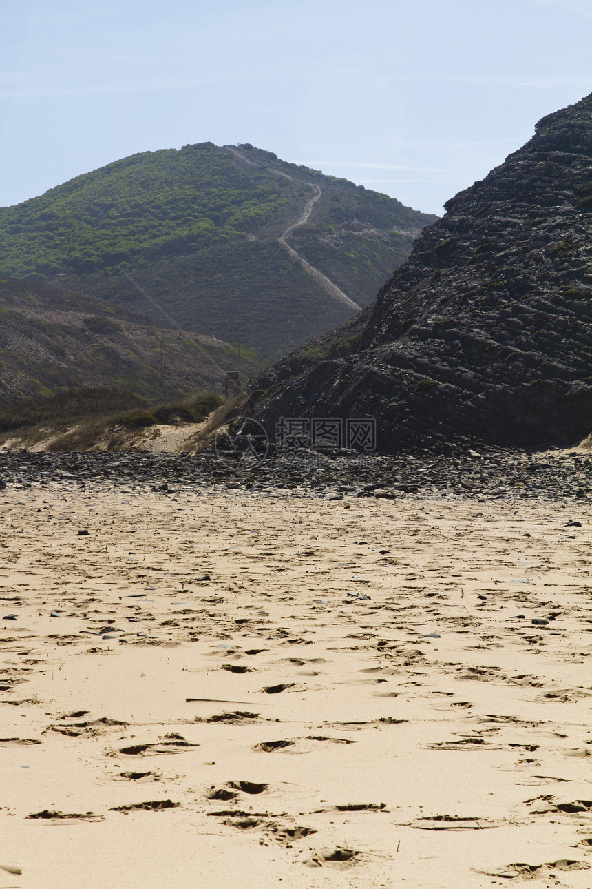 沙格里斯美丽的海滩支撑海岸晴天岩石蓝色天空旅行海岸线悬崖植被图片