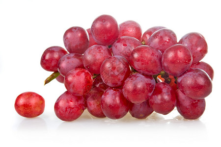 一群熟熟的粉红葡萄被孤立健康食物叶子小吃白色水果农业团体植物粉色背景图片