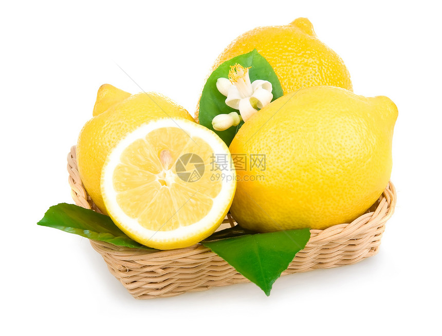 在篮子中孤立的黄色柠檬水果白色食物团体绿色叶子果汁图片