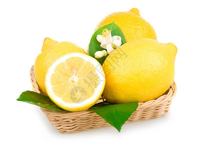 在篮子中孤立的黄色柠檬水果白色食物团体绿色叶子果汁背景图片