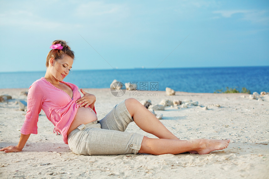 怀孕休息分娩女士肚子地面女孩福利太阳成人母性图片