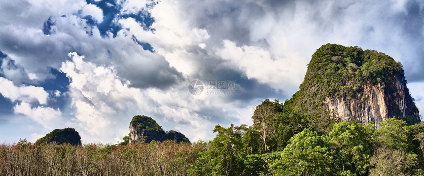 泰国山悬崖阳光环境丛林生态戏剧性国家农村旅行灌木丛图片