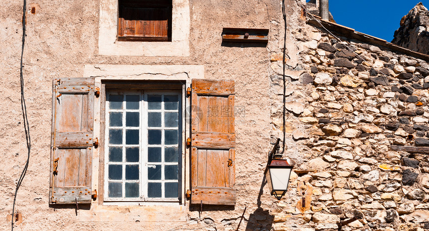 法语窗法国窗口住宅框架石头传统房子城市安全街道窗户反射图片