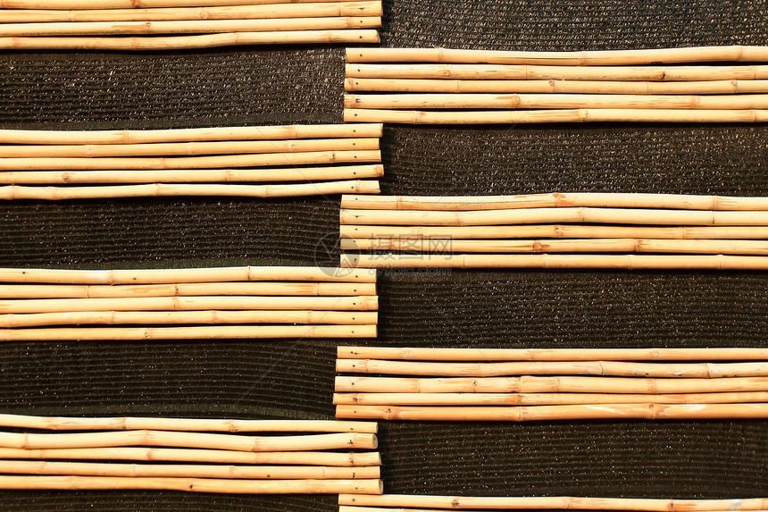 竹棒的背景背景丛林森林花园竹子木头植物黄色手杖树干材料图片