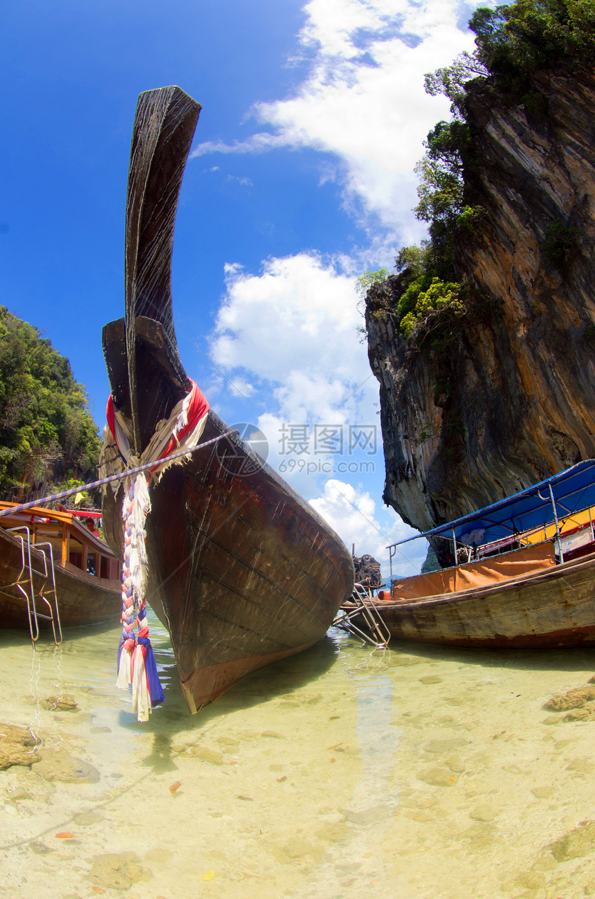 船只和岛屿尾巴旅游假期热带珊瑚天空天堂旅行运输海景图片