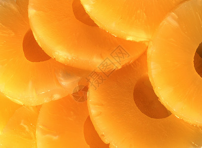 黄罐头菠萝环 素食菠萝食物戒指黄色水果生活方式圆圈横截面背景图片