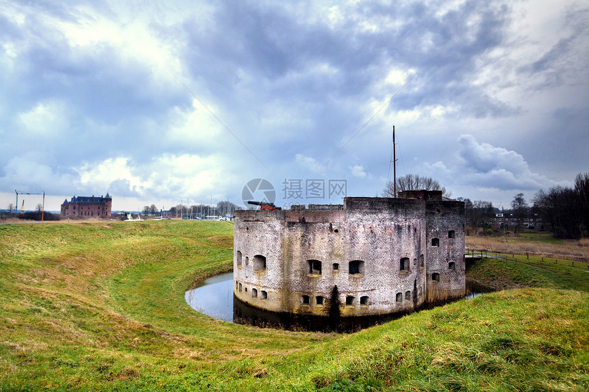 穆伊登的加固废墟城堡天气池塘建筑学爬坡风暴多云旅行天空图片