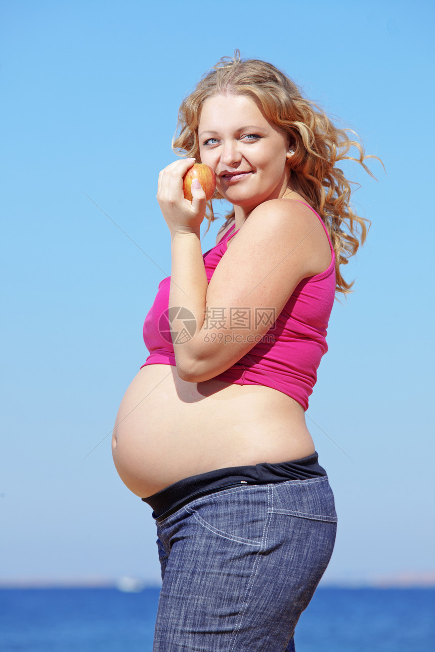 怀孕女性肚子蓝色成人冒充女士母性福利水果闲暇图片