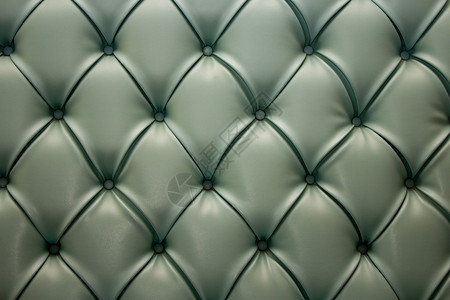皮革衬垫绿色家具复兴复古沙发菱形装潢六边形纺织品背景图片