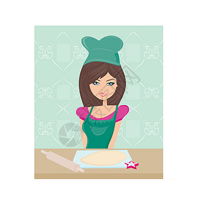 吃饼干的女孩美丽的女士烹饪饼干女性房子勺子围裙快乐家务蛋糕液体衣服家庭设计图片