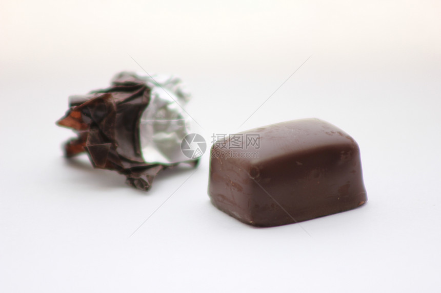 巧克力糖果 有包装在背景中图片