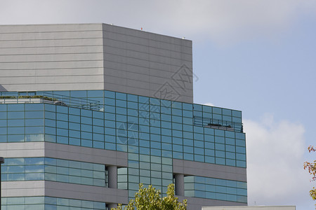 现代办公大楼城市摩天大楼房地产办公室办公楼玻璃公司背景图片