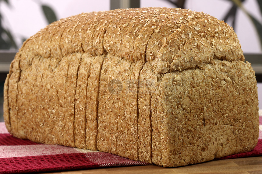 整个谷物面包小麦面团向日葵营养燕麦厨房面包师坚果早餐午餐图片