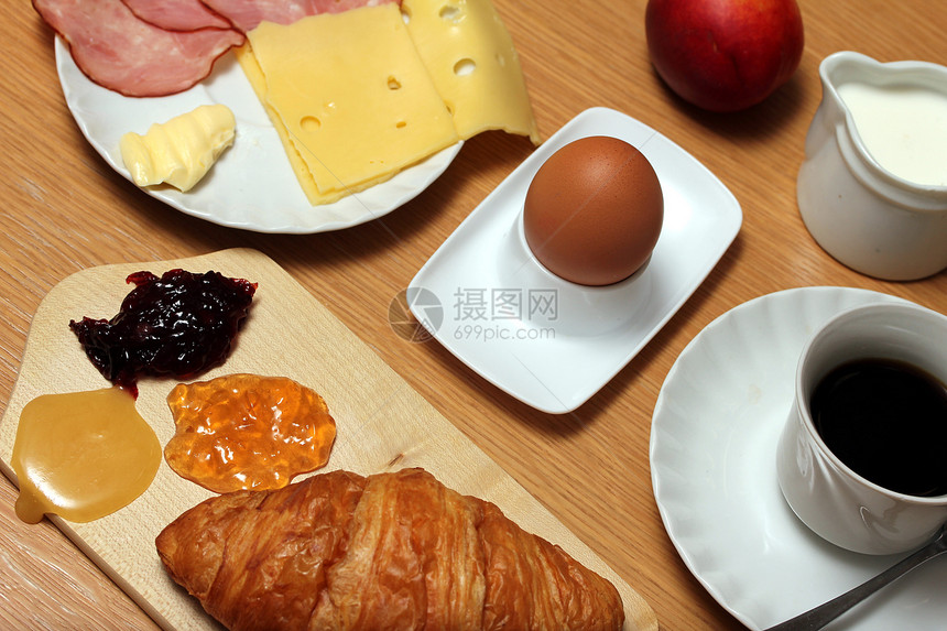 早餐桌牛奶咖啡包子环境香肠食物桌子面包蜂蜜橙子图片