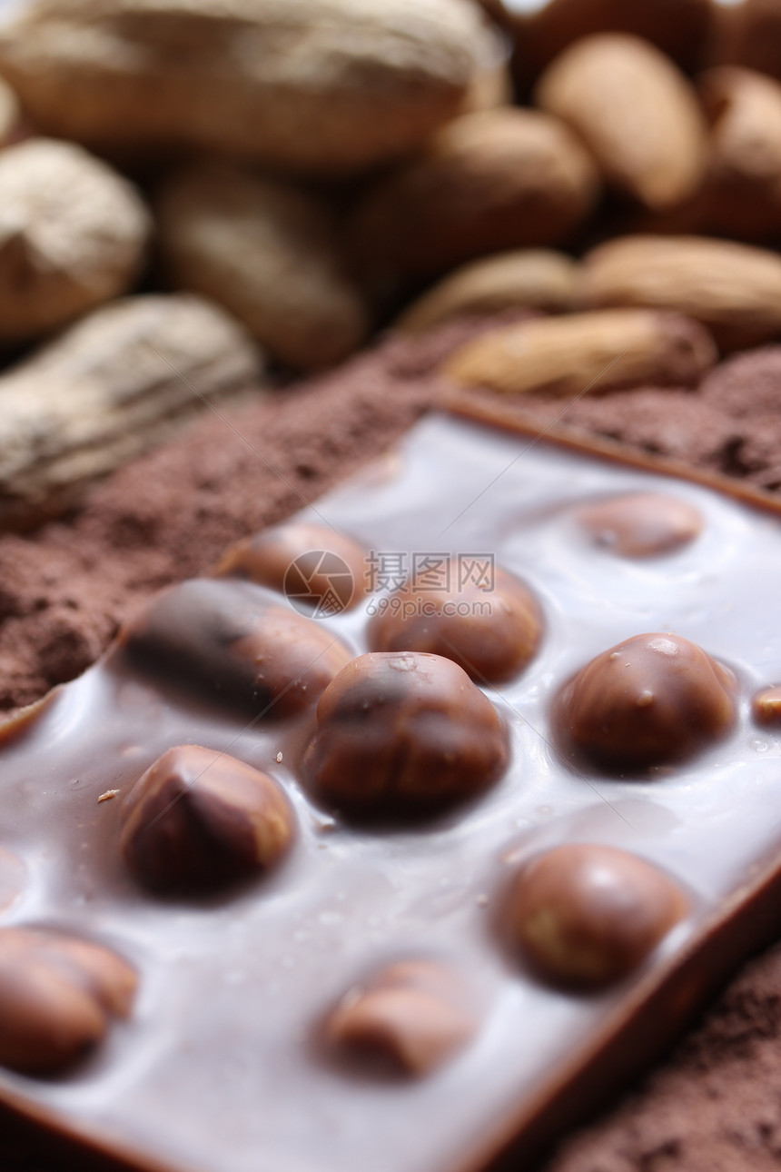 坚果巧克力背景牛奶杏仁饮食花生美食甜点粉末棕色可可食物图片