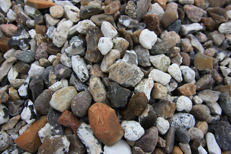 混乱圆形岩石石头灰色类型打火石白色收藏棕色背景图片