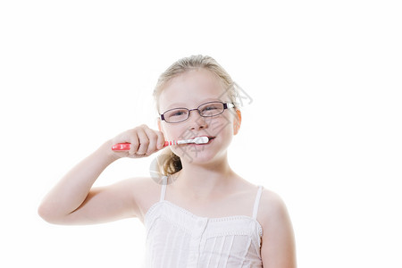 刷牙牙齿女孩牙膏口服牙科白色眼镜健康孩子卫生背景图片