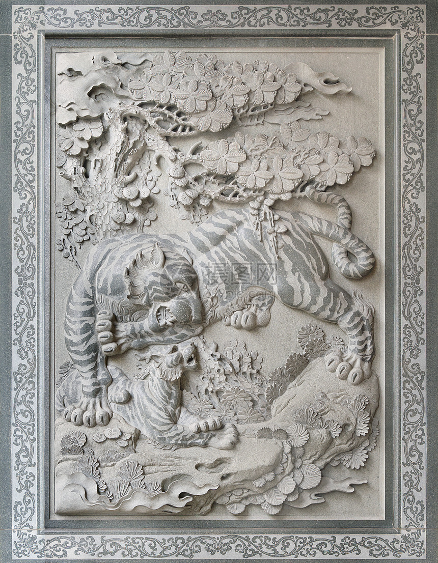 老虎和中华天庙墙石雕像图片